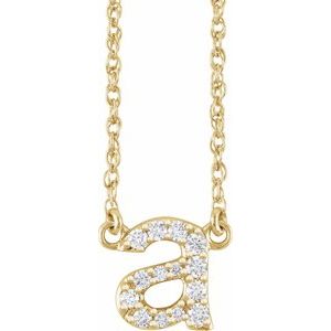 Gold necklace with a diamond-encrusted lowercase letter 'a' pendant