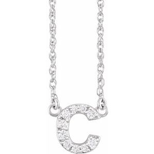 Diamond-encrusted letter C pendant on a silver chain