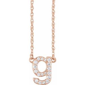 Rose gold initial letter G pendant necklace with sparkling diamonds.