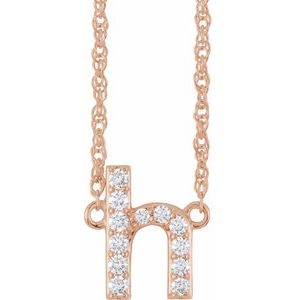 Rose gold initial letter H pendant necklace with sparkling pavé diamonds.