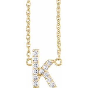 Gold necklace with a diamond-encrusted letter K pendant