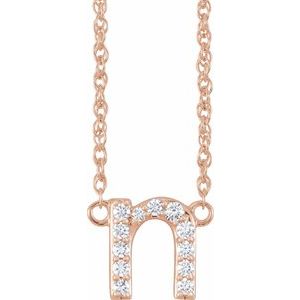 Rose gold initial N pendant necklace adorned with sparkling diamonds