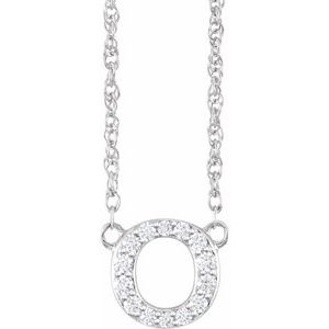 Silver necklace with a circular pendant encrusted with small diamonds