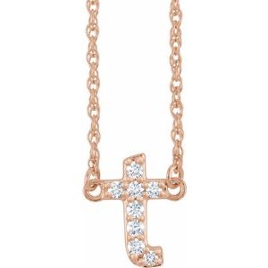 Rose gold cross necklace featuring sparkling pavé diamonds on a delicate chain.