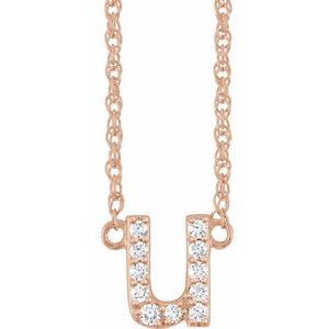 Rose gold initial U pendant necklace featuring pavé set diamonds.