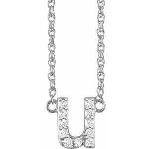 Silver letter U pendant necklace encrusted with sparkling diamonds.