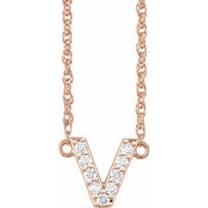 Rose gold initial V necklace with sparkling pavé diamonds.