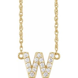 Gold initial W pendant necklace encrusted with sparkling diamonds.