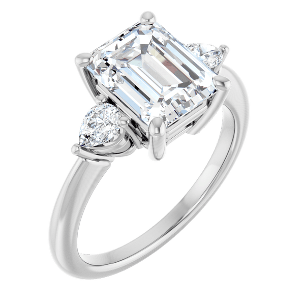 Emerald cut diamond engagement ring with pear shaped side stones in white gold.