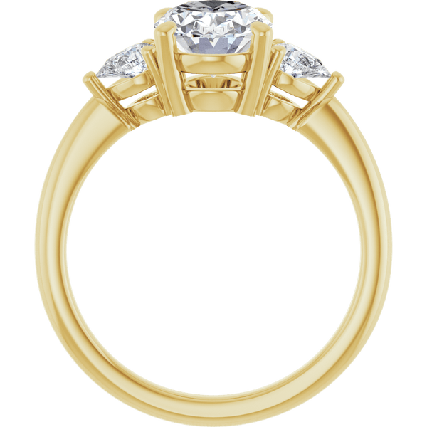 Three-stone engagement ring in yellow gold with brilliant round diamonds.