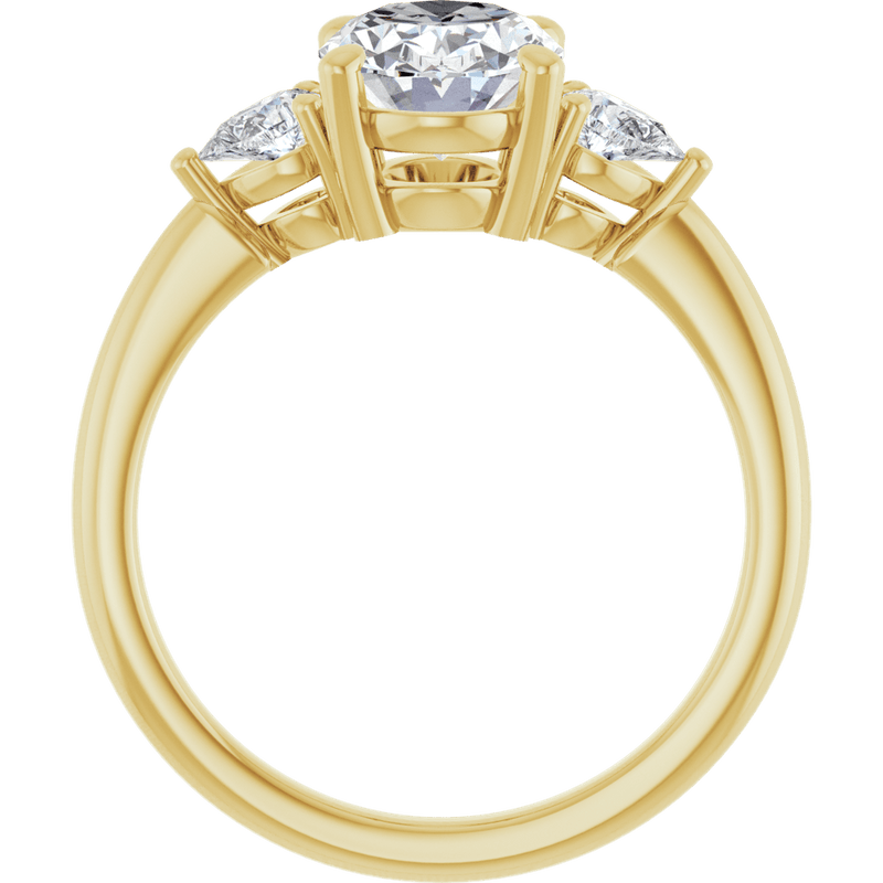 Three-stone engagement ring in yellow gold with brilliant round diamonds.