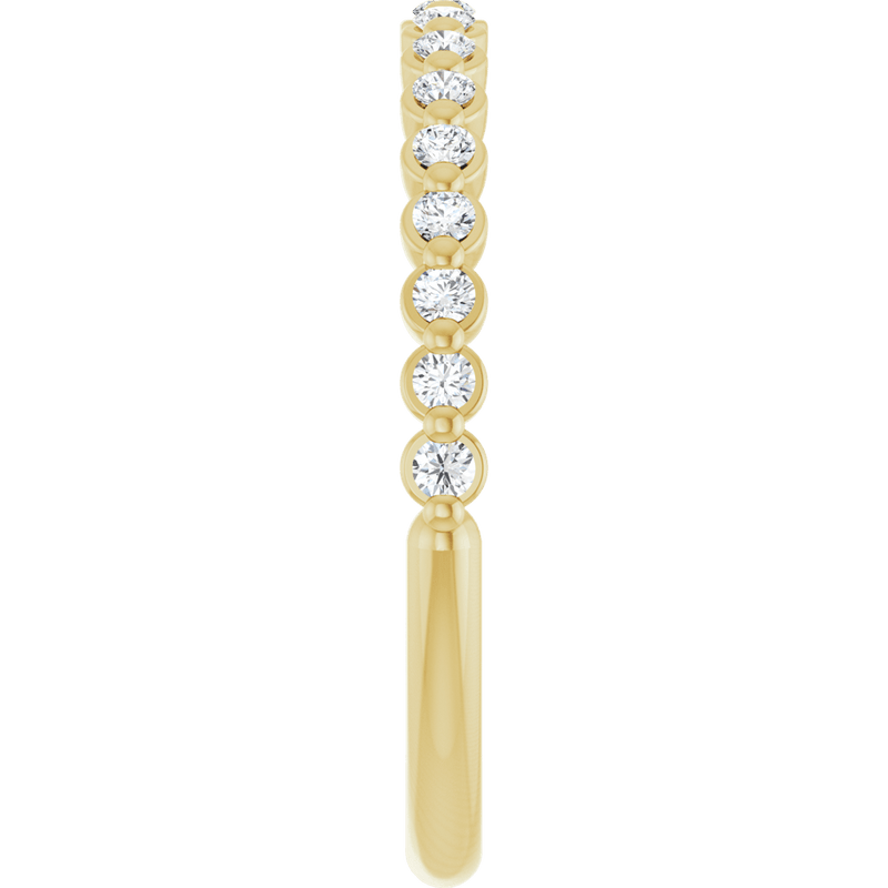 14k yellow gold eternity ring featuring round brilliant lab-grown diamonds.