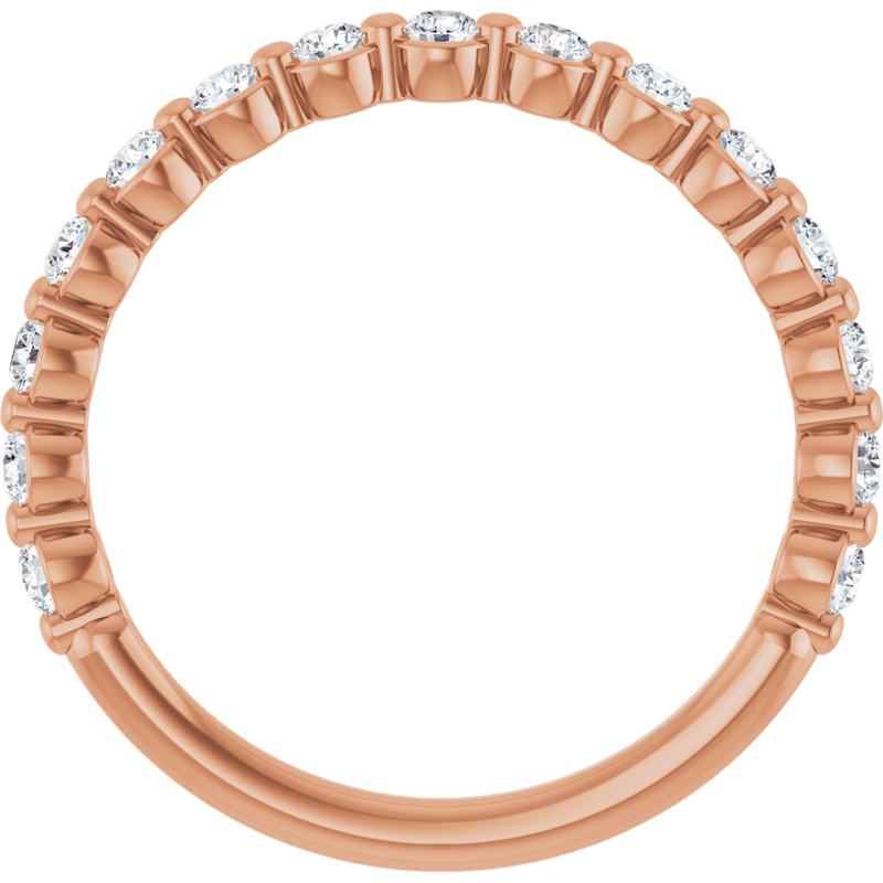Rose gold eternity ring set with brilliant round-cut diamonds.
