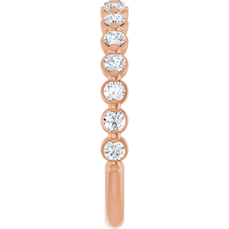 Rose gold eternity ring featuring brilliant round-cut lab-grown diamonds.