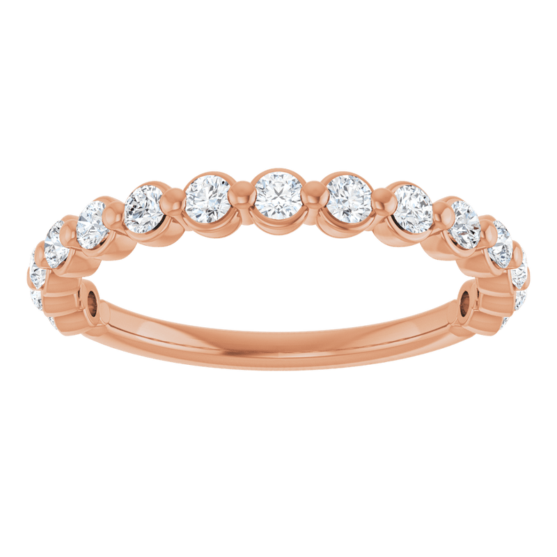 Rose gold eternity band featuring round brilliant cut lab-grown diamonds.
