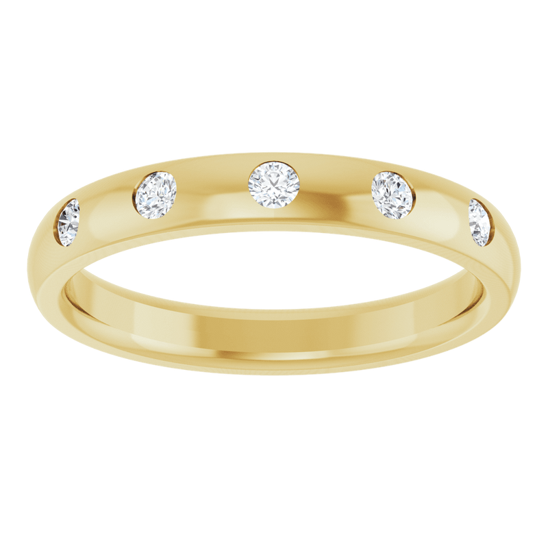 Gold ring featuring ethically sourced round-cut lab-grown diamonds in a bezel setting.
