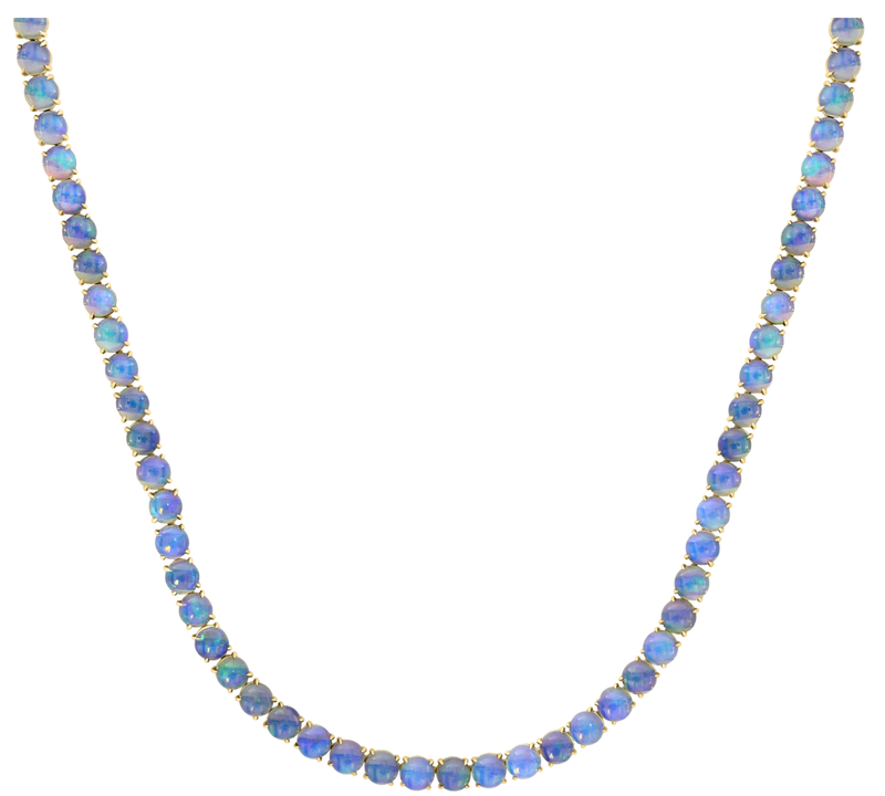 A beaded necklace made of small round blue and iridescent opal beads, displayed on a plain white background.