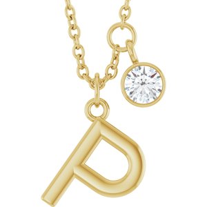 Gold initial P necklace with a small round diamond charm