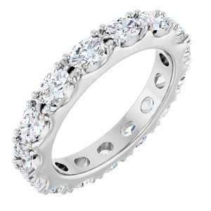 Elegant white gold eternity ring featuring round brilliant cut lab-grown diamonds.