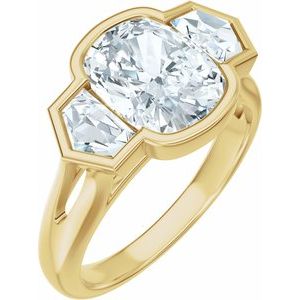 Yellow gold ring featuring a large oval diamond flanked by two pear-shaped diamonds.