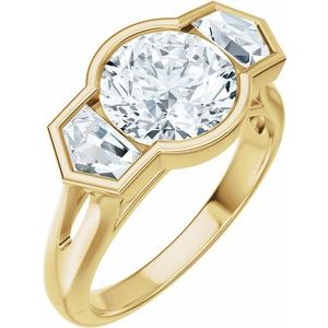 Yellow gold engagement ring with a round center diamond and trillion side stones