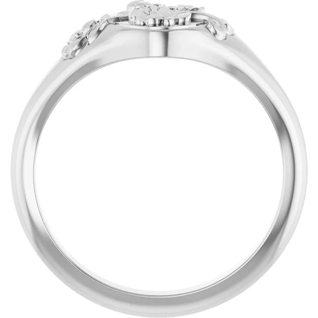 Close-up of a white gold floral ring band with diamond accents