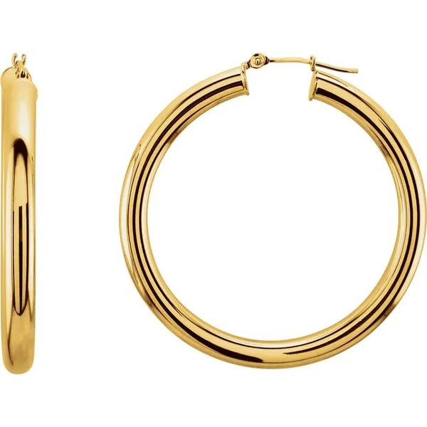 Polished 14k yellow gold thick hoop earrings with a smooth tubular design.