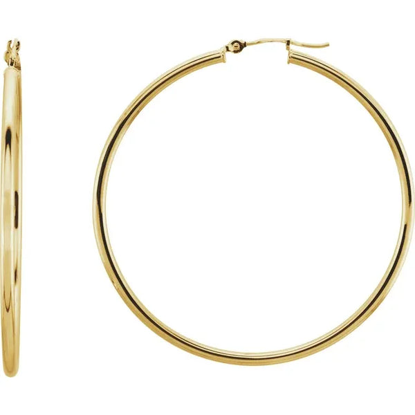 Large gold hoop earrings with a polished finish.