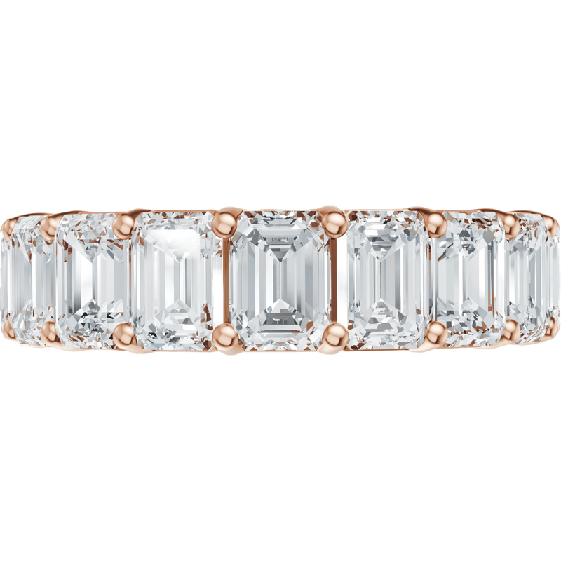 Emerald cut lab-grown diamond eternity band in recycled rose gold.