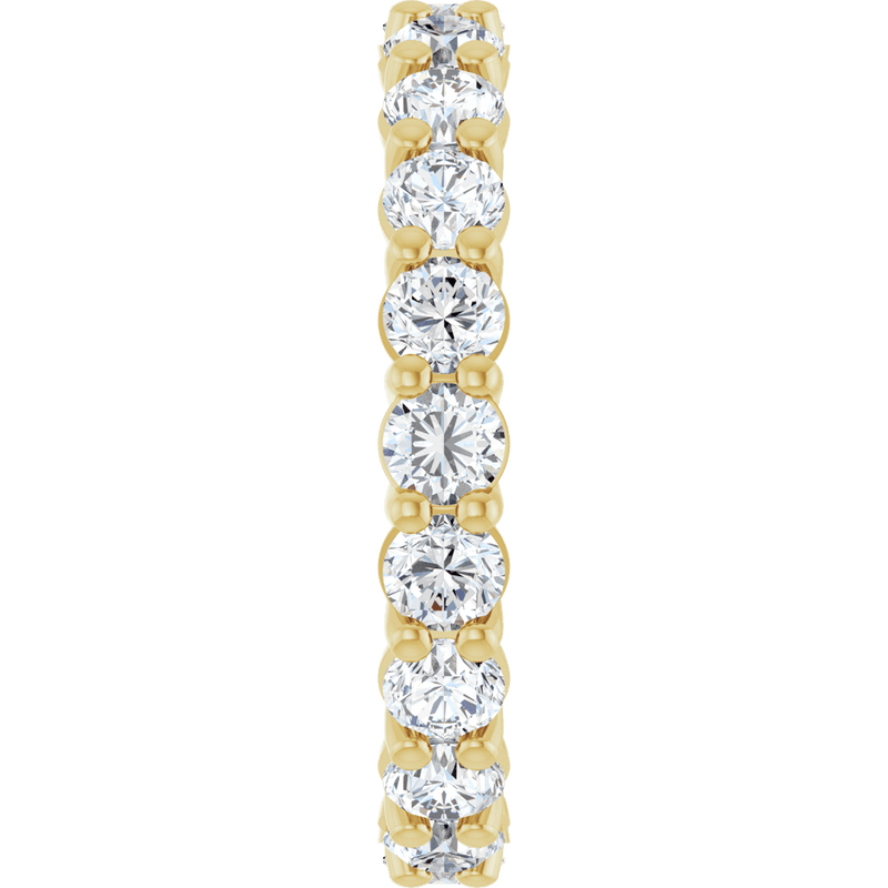 Yellow gold eternity ring set with brilliant round cut diamonds.