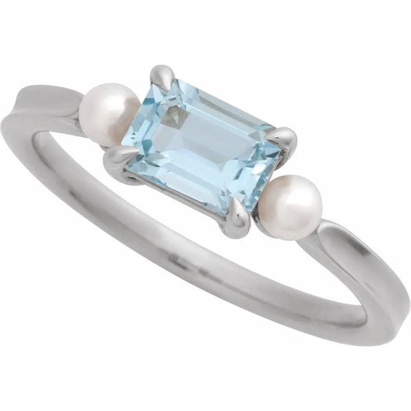 Beucher Paris 14K white gold ring with emerald-cut sky blue topaz and two white Akoya pearls