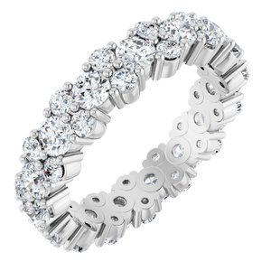 Elegant continuous eternity band ring featuring brilliant round-cut diamonds in white gold.