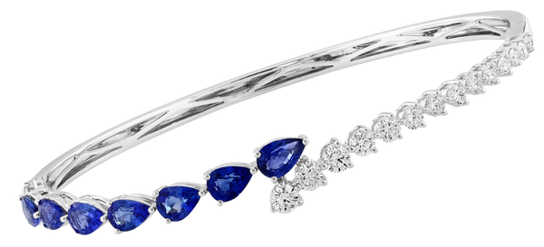 Pear-shaped blue sapphire and diamond bangle bracelet in white gold