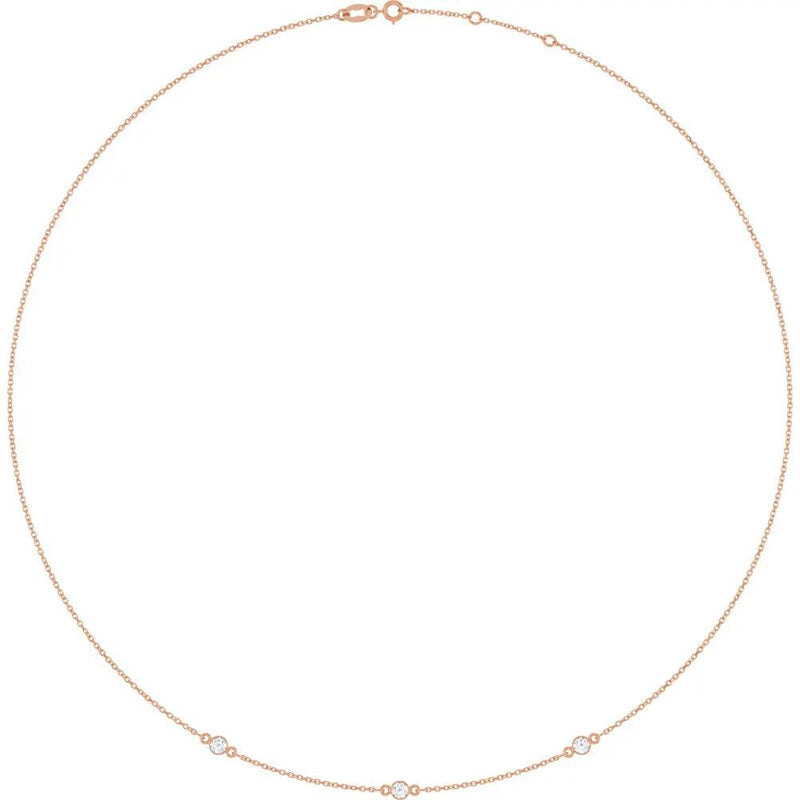 Ricochet sur Luzège, Rose Gold Three Stone Bezel Diamond Necklace