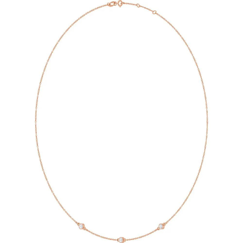 Ricochet sur Luzège, Rose Gold Three Stone Bezel Diamond Necklace