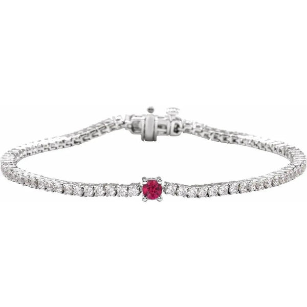 Beucher Paris ruby and diamond tennis bracelet with a central red gemstone.