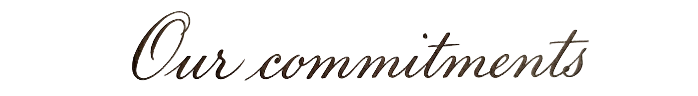 The phrase 'Our commitments' written in elegant black cursive script across a clean, textured white background.