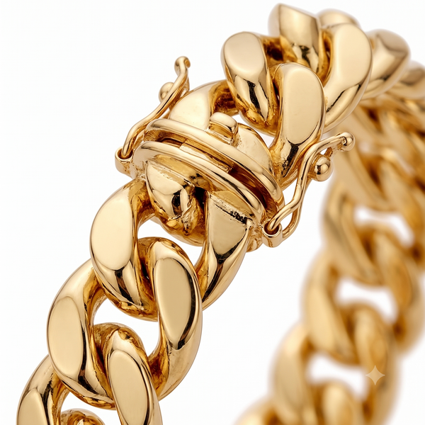 A close-up of a chunky gold Cuban link chain bracelet, highlighting the polished links and clasp mechanism against a clean white background.