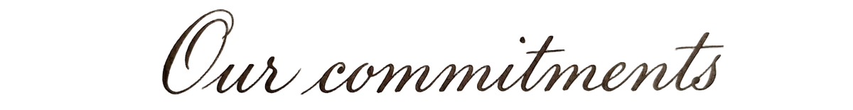 The words "Our commitments" written in an elegant, cursive font against a black background.