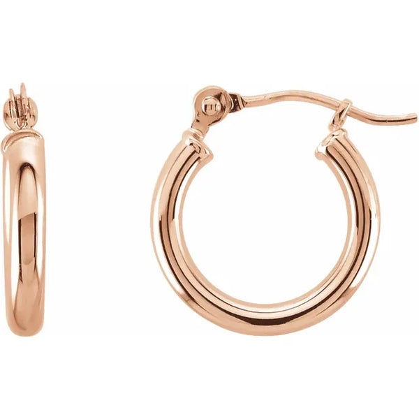 Rose gold hoop earrings with a polished finish.