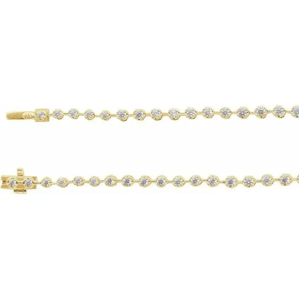 Two yellow gold chains featuring a row of round lab-grown diamonds